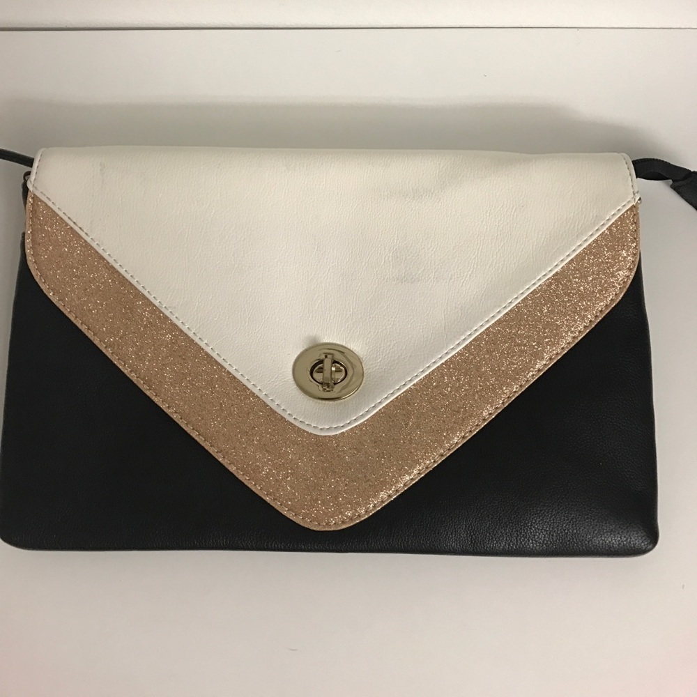 Black, white, rose gold faux leather clutch